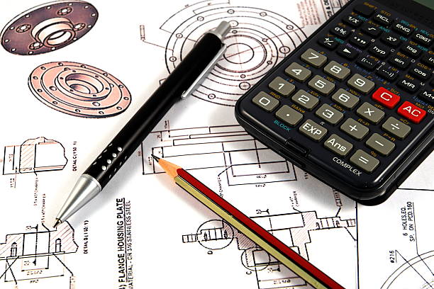 istock Scientific calculator, Pen and Pencil over the Engineering Drawing Map 475252516