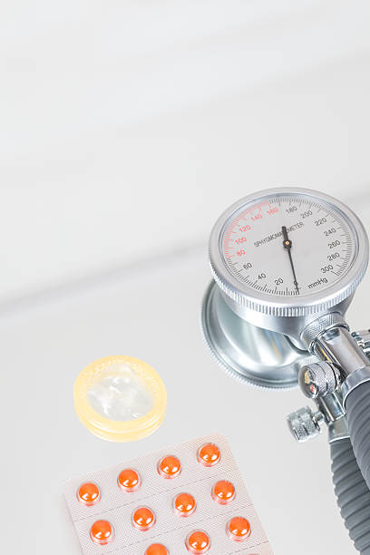 Blood pressure gauge, condom and blister pack