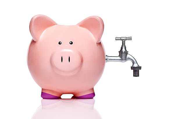istock piggy bank with faucet 475252823
