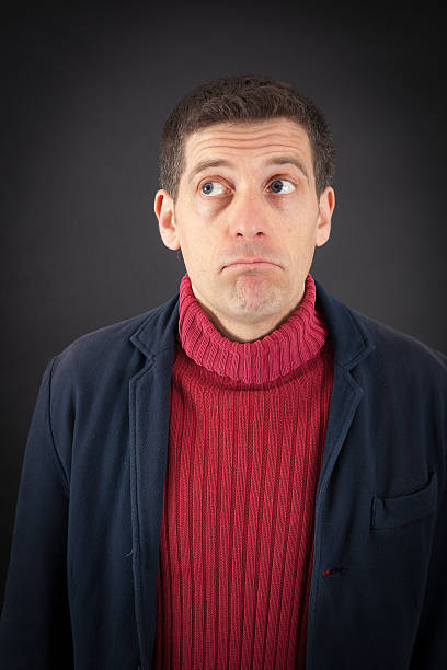 istock Handsome man doing different expressions in different sets of clothes 475253572