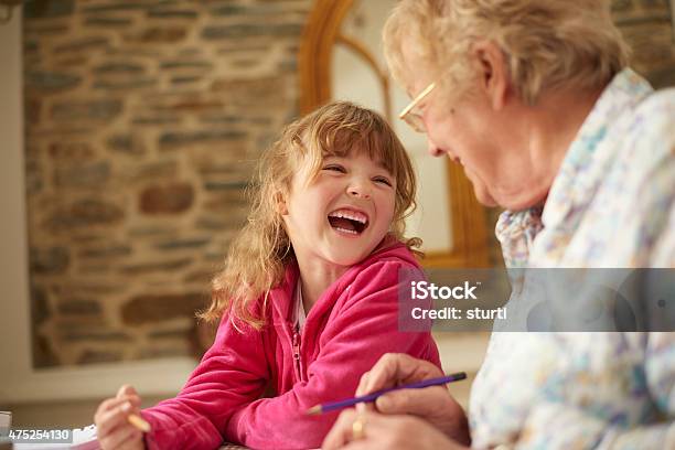 Fun With Grandma Stock Photo - Download Image Now - Child, Grandmother, Sharing