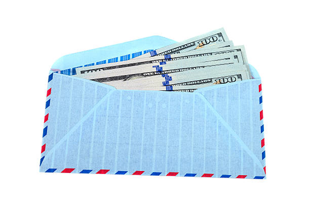istock Envelope with cash in dollars isolated on white background 475254267