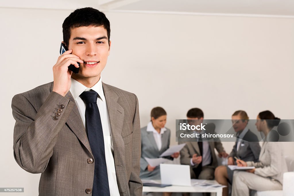 Business call Photo of female employee speaking on the phone with smile   Note to inspector: the image is pre-Sept 1 2009 2015 Stock Photo