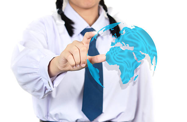 istock girl student in school uniform connected the world 475258492