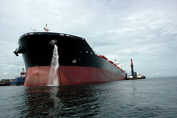 tanker ship the bow of a big tanker ship, which was anchored in the middle of the ocean ballast water stock pictures, royalty-free photos & images