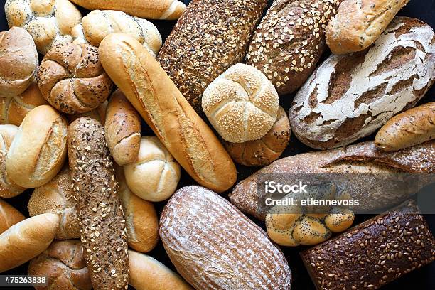 Many Mixed Breads And Rolls Shot From Above Stock Photo - Download Image Now - Bread, Bakery, Dough