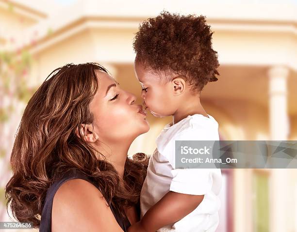 Happy Mother With Cute Son Stock Photo - Download Image Now - Mother, Son, Kissing