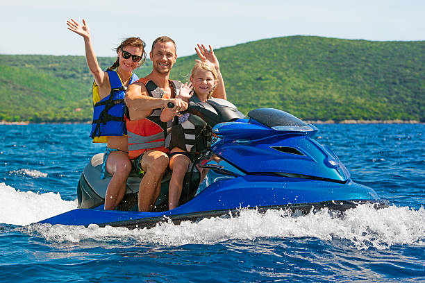 istock Family Riding a Jet Boat 475267606
