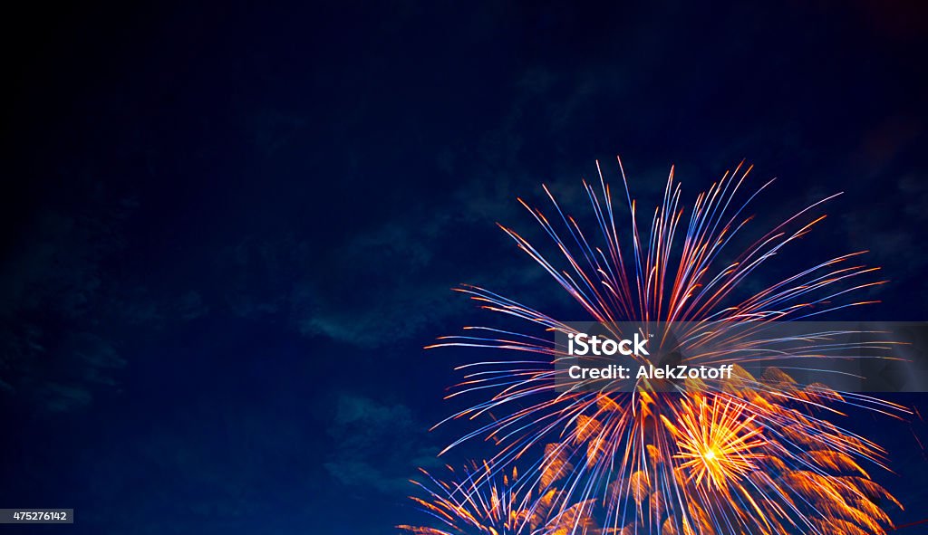 Framed Explosion 4th July fireworks. Fireworks display on dark sky background. Firework - Explosive Material Stock Photo