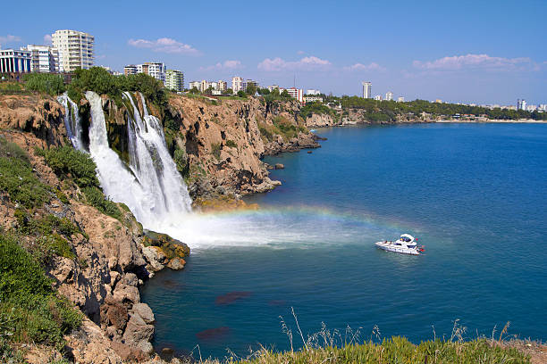 Wonderful rainbow on Duden river Waterfall  in Antalya, Turkey stock photo