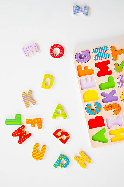 istock Colorful letters, alphabet puzzle on white background 475281444