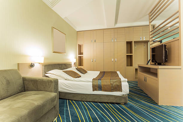 istock Elegant hotel room interior 475284934