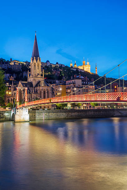 istock View of Lyon and red footbridge 475285150