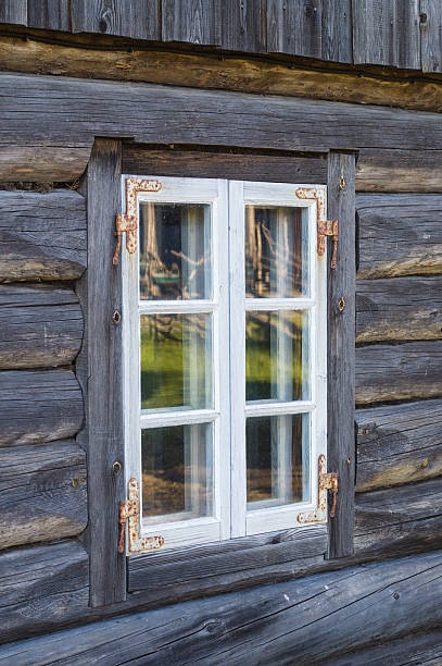 istock Rustic cottage window in old wooden rural house 475291802