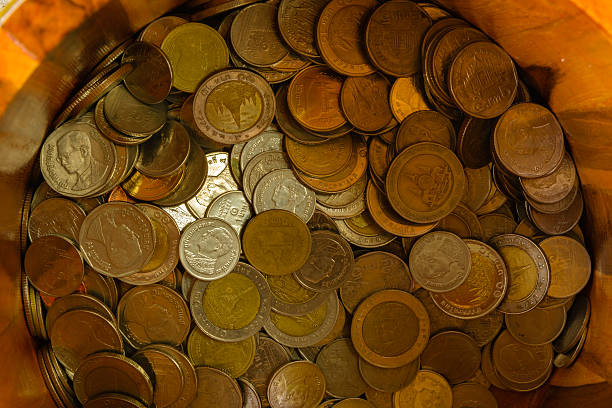 istock Baht Thailand coins in a bucket 475292094