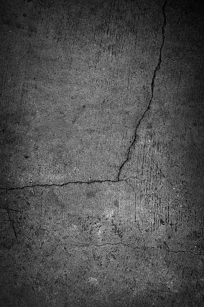 istock Grunge concrete cement wall with crack in industrial building, g 475292776