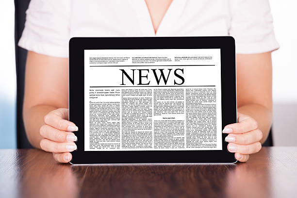 istock Woman Holding Touch Screen Tablet Pc With Business Article 475292784