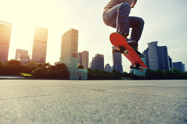 istock skateboarder doing skateboarding trick ollie on city 475294192