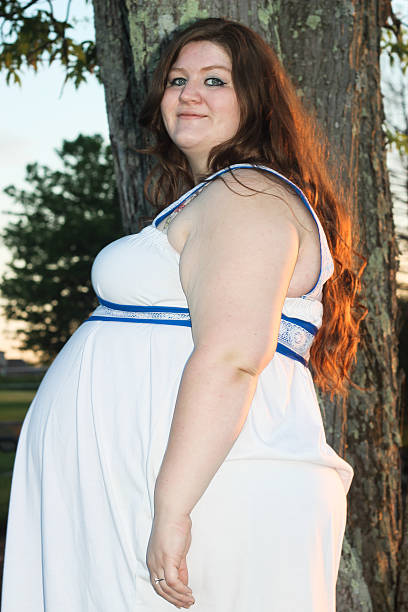 istock Side View of Pregnant Woman in Third Trimester 475294486