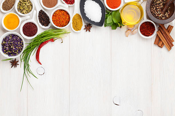 istock Various spices on white wooden background 475297130