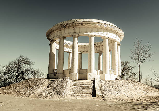 Old ratonda with columns on the sky background