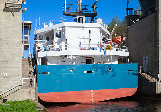istock Big cargo ship comes into the Tsvetochnoye lock 475301030