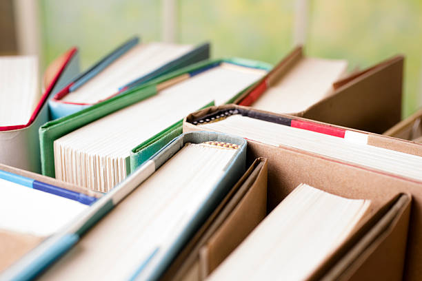 istock High angle view of many hardback books. Library or school. 475301300