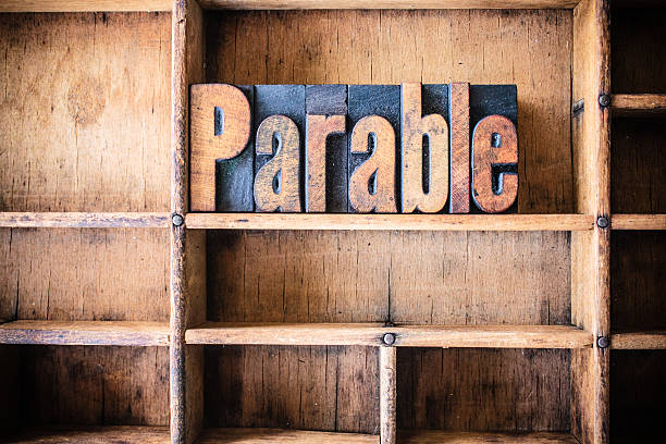 Parable Concept Wooden Letterpress Theme The word PARABLE written in vintage wooden letterpress type in a wooden type drawer. allegory painting stock pictures, royalty-free photos & images