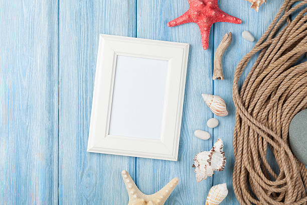 istock Blank photo frame, star fish and marine rope 475306438