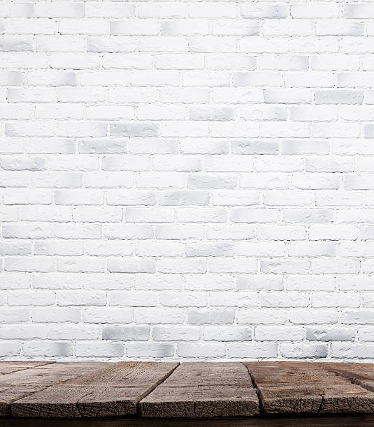 istock interior vintage with white brick wall and wood floor background 475306506