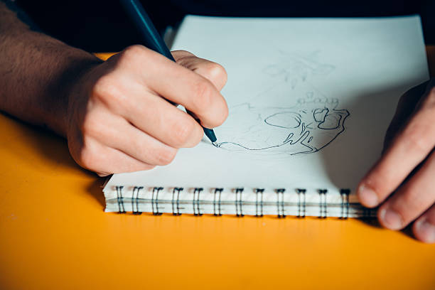 istock Tattoo Artist Drawing 475310910