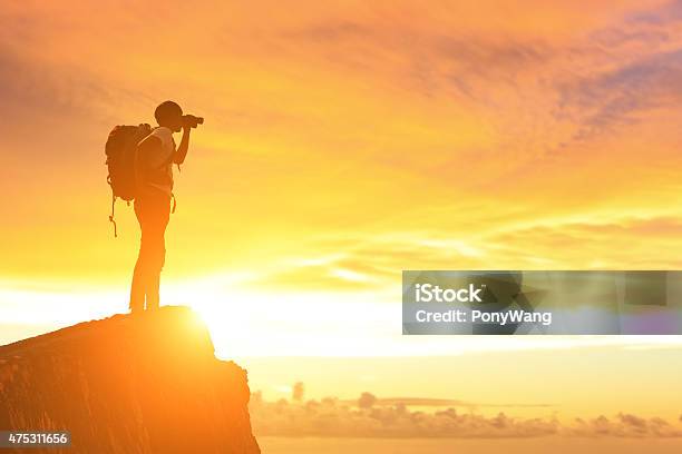 Success Man On The Mountain Stock Photo - Download Image Now - Binoculars, Cliff, Men