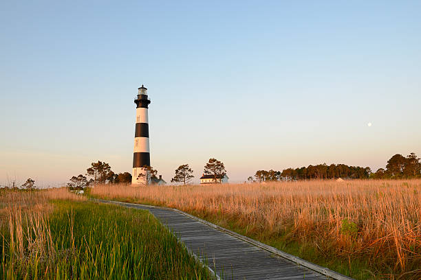 istock Bodie Lighthouse at Sunrise with Moon 475312738