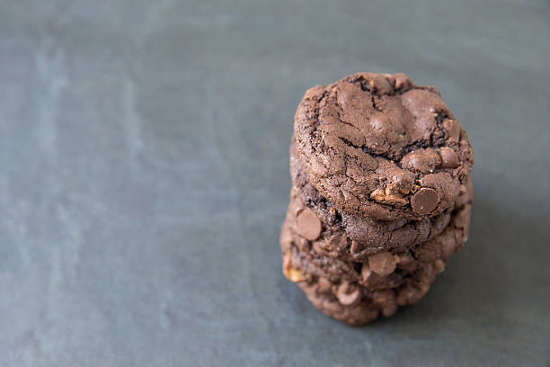 istock Chocolate chip cookies on slate background 475314682