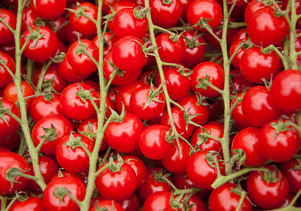 istock Cherry tomatoes at market in Paris. 475317272