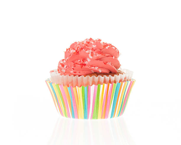 istock Orange fosted cupcake with striped paper liner 475318852