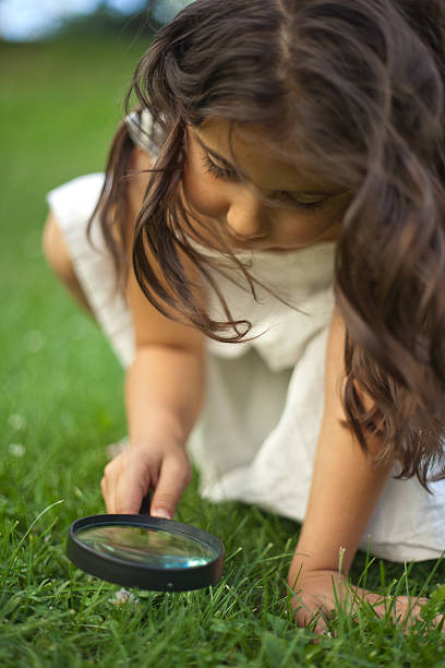 istock Little Girl Exploring Nature 475320253