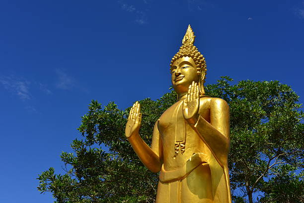 Ancient Buddha statue wearing a cerimonial robe at Wihan Phra Mongkhon Bophit temple. Ayutthaya. Phra Nakhon Si Ayutthaya province. Thailand.
