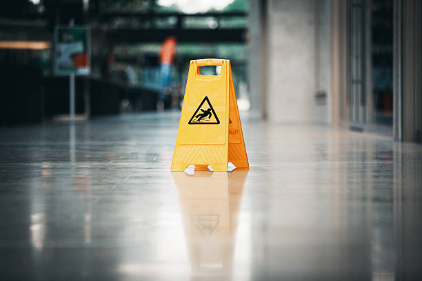 warnschild glatt - floor wet slippery danger stock-fotos und bilder