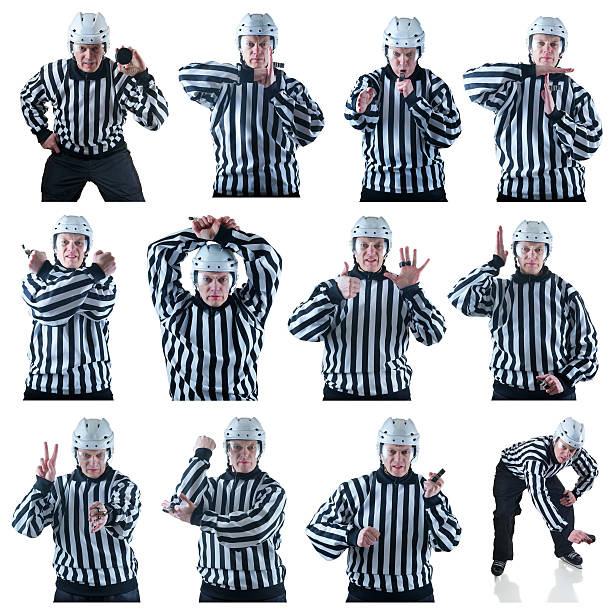 Collection of hockey referees gestures Collection of Hockey referee images with some penalty signals. On the white background checking ice hockey stock pictures, royalty-free photos & images