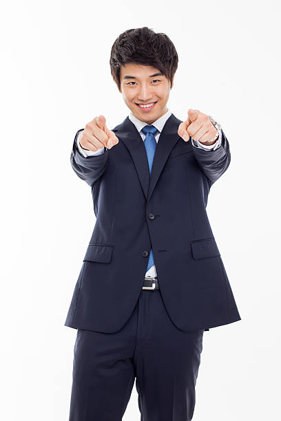 istock Young asian man indicated up side. 475325961