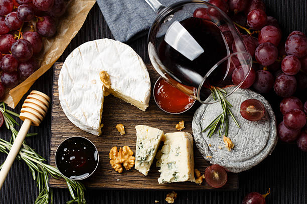 istock Cheese plate served with wine, jam and honey 475327706