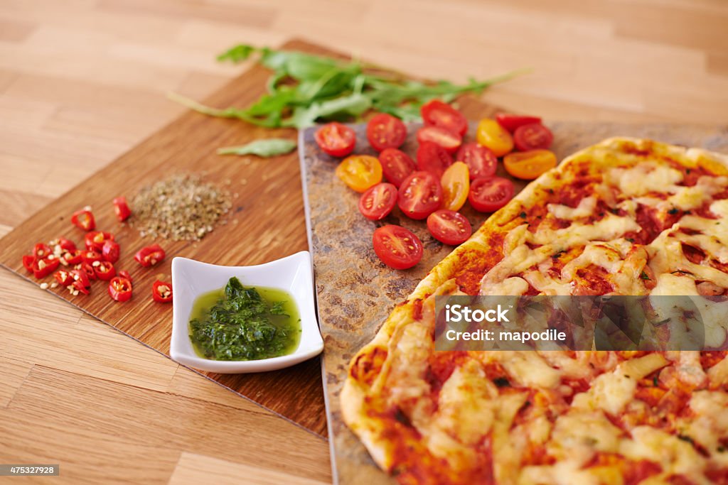 So many tasty toppings to choose from Cropped shot of a pizza base with various toppings beside ithttp://195.154.178.81/DATA/i_collage/pu/shoots/804695.jpg 2015 Stock Photo