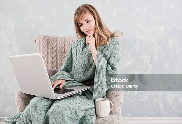 Woman Working At Home Using Laptop Stock Photo - Download Image Now - 2015, Adult, Adults Only