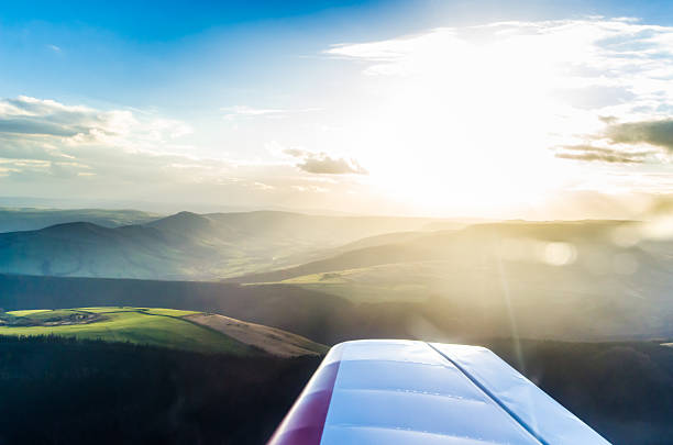 istock Beautiful sunset seen from a plane of mountains 475329232