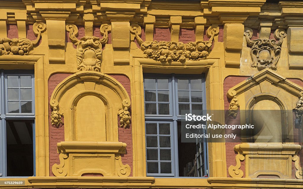 Lille Building Lille, France - August 29, 2013: Close up of building facades in Lille only showing the window and ornate plaster work. 18th Century Style Stock Photo