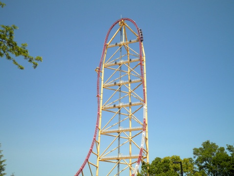 Giant roller coaster drop in amusement park.