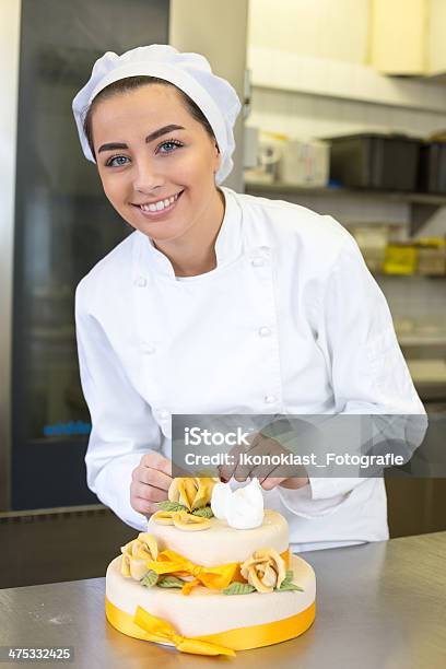 Confectioner Baker Or Pastry Cook Preparing Cake Stock Photo - Download Image Now - Confectioner, Candy Store, Adult