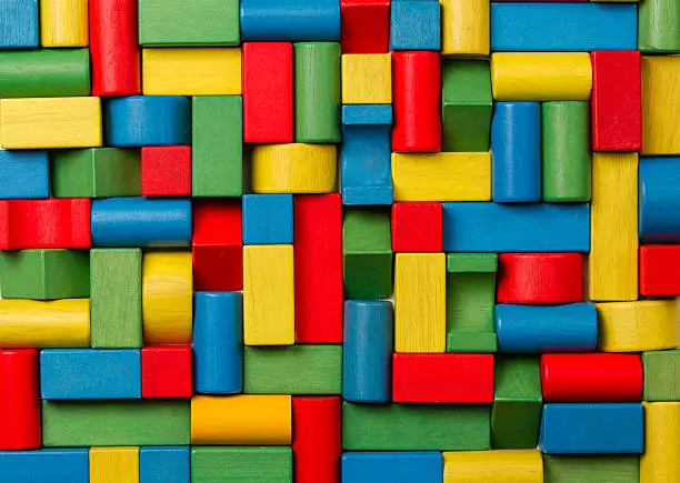 Photo of Toys blocks wooden bricks, group of colorful building game pieces