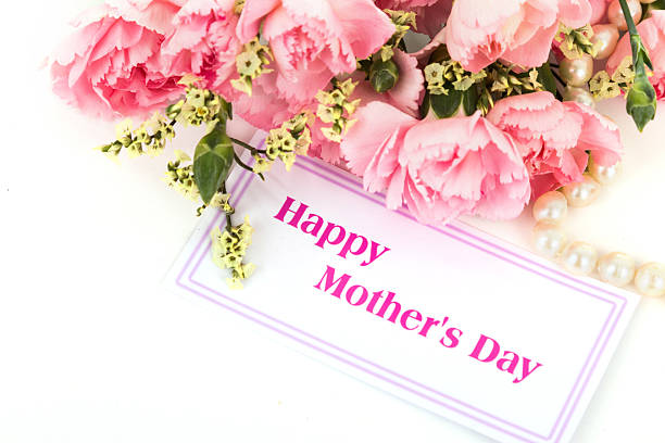 istock Pink carnations and mother's Day gift, greeting cards. 475335373